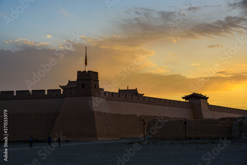 13th century Jiayuguan Pass, first frontier fortress at the west end of the Great Wall in Gansu Province, China photo