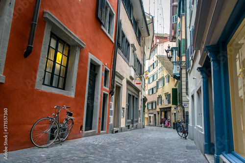 Old Bike on Side of Beautiful Narrow Street in Zurich's Old City - Zurich, Switzerland  © Nate Hovee