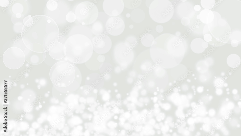 White lights bokeh, defocus glitter blur on gray background. Bokeh christmas blurred beautiful shiny.