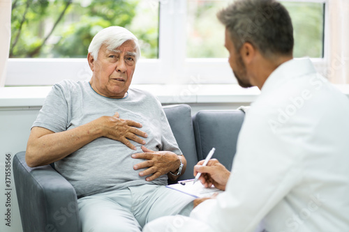 Home Care Elder Patient Talking To Doctor