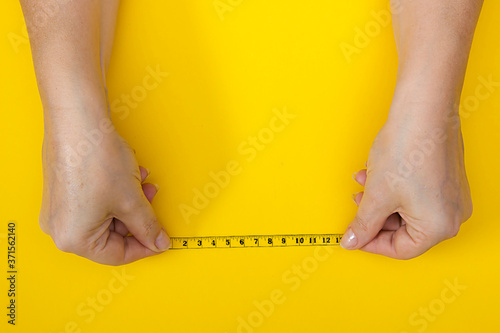 Woman with tailor meter