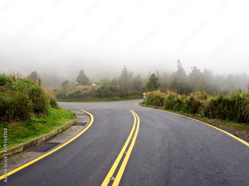 Road in mountain range in fog,Taipei Road in mountain range in fog,Taipei