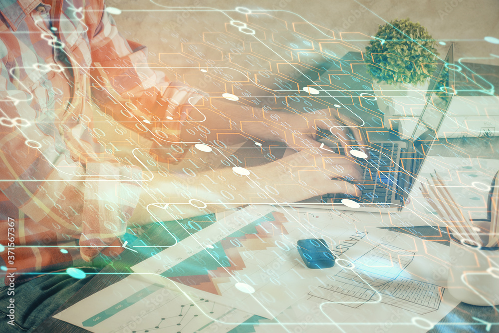 Double exposure of technology hologram with man working on computer background. Concept of big data. Double exposure of technology hologram with man working on computer background. Concept of big data.