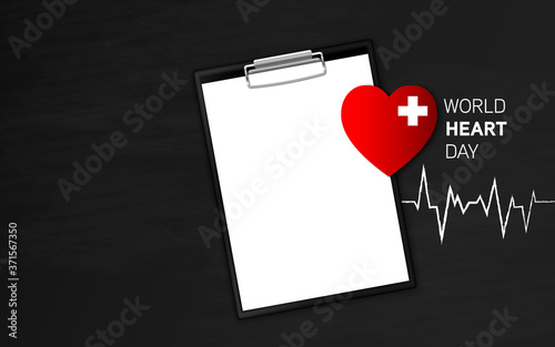 Top view world heart day concept with notepad