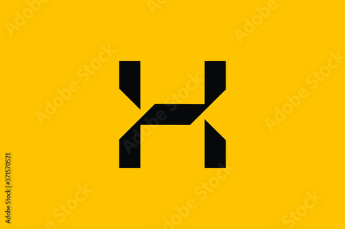 Minimal Innovative Initial X logo and H logo. Letter X H creative elegant Monogram. Premium Business logo icon. Black color on background