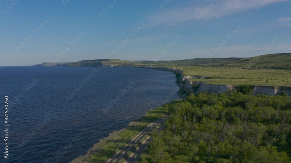 Steep bank of the river from a bird's eye view. Bank of the Volga River in Russia. Aero 4k Steep bank of the river from a bird's eye view. Bank of the Volga River in Russia. Aero 4k