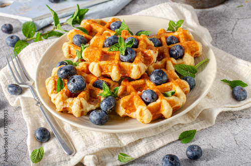 Homemade waffles with berries photo