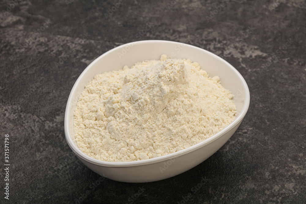 Wheat flour heap in the bowl Wheat flour heap in the bowl