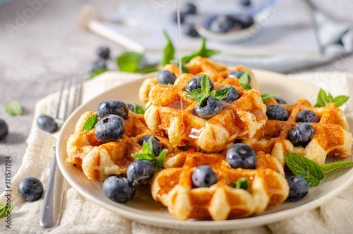 Homemade waffles with berries photo