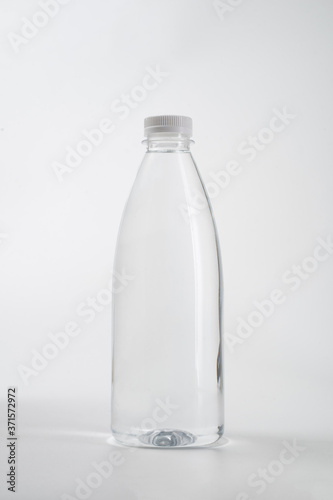 water bottle. fresh liquid food product on blank plastic container bottle mockup
