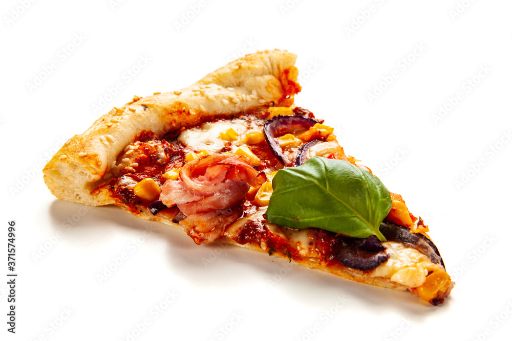 Pizza with ham, mozzarella, champignon and vegetables on white background
Pizza with ham, mozzarella, champignon and vegetables on white background