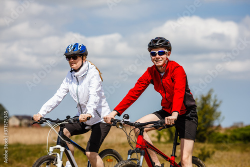 Healthy lifestyle - people riding bicycles 