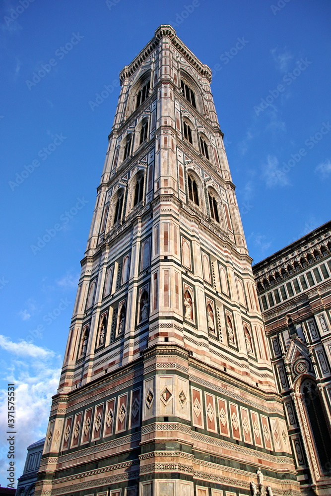 Detail of the famous giotto's campanile, bell tower of the basilica of Santa Maria del Fiore (Saint Mary of the Flower), cathedral of Florence, Italy.
