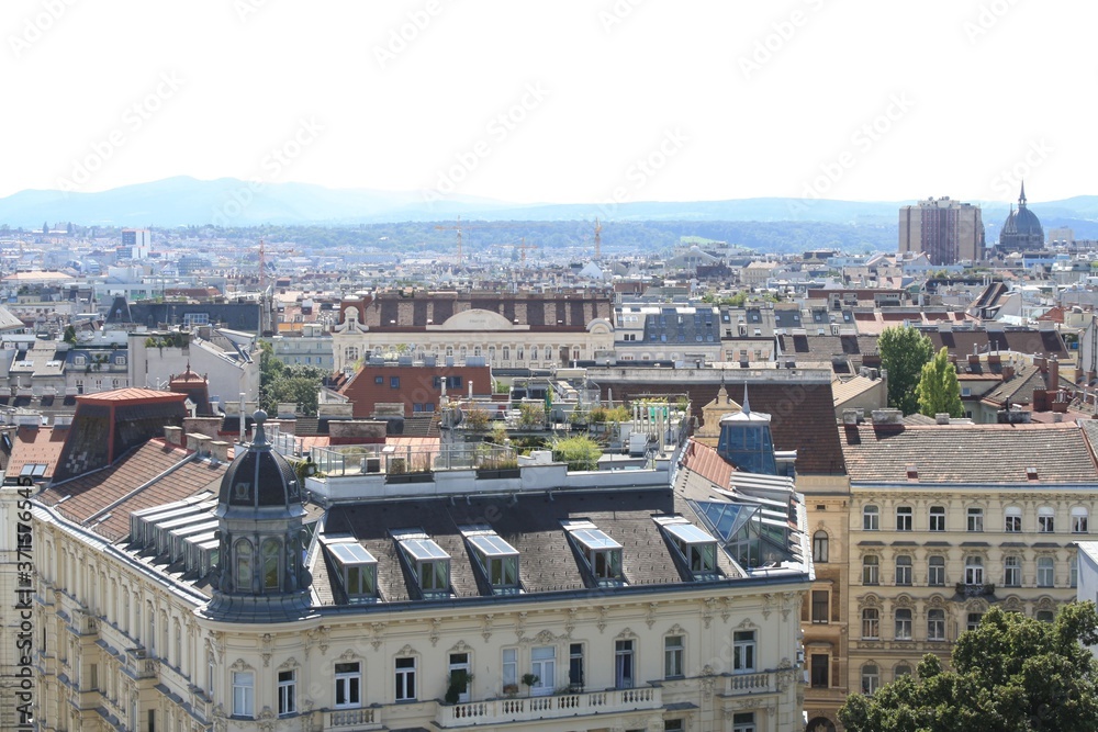 A view of a Wien city with large buildings in the background