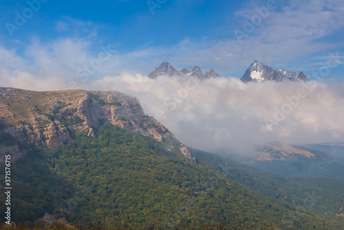 mountain plateau in a mist and dense clouds, outdoor travel background