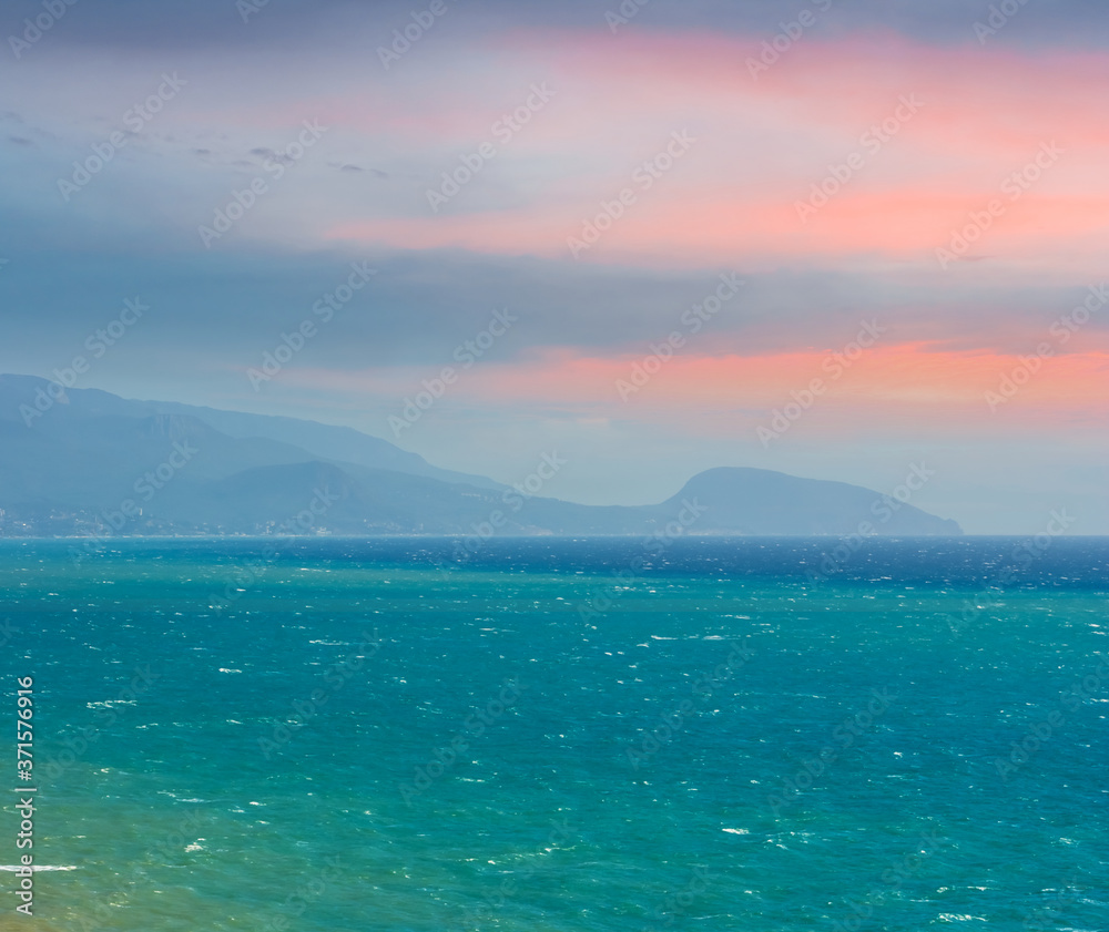 emerald sea bay at the early morning , dawn marine scene