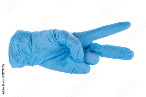 Blue latex medical gloves isolated on white background.