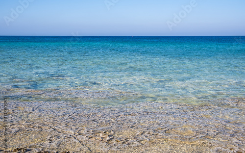 Fototapeta Naklejka Na Ścianę i Meble -  Seascape with turquoise clear blue water and blue sky with copy space.