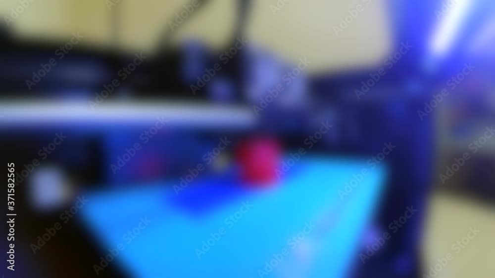 Blurred background. Printing a 3d printer view from the inside