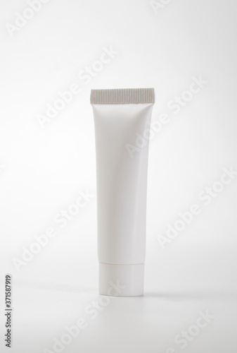 Tube pouch standing white plastic product mockup. over white background