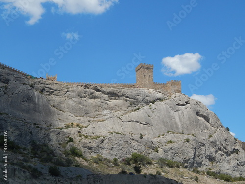 genoese fortress, castle on a rock, sunny