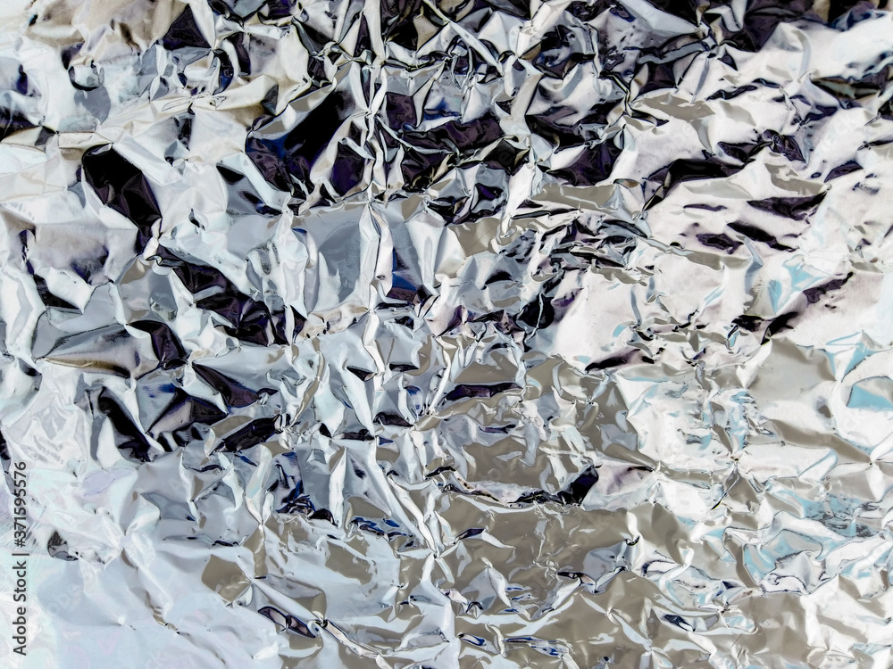Abstract texture pattern metallic paper using as a background or wallpaper. Metal aluminum foil shiny and reflector Abstract texture pattern metallic paper using as a background or wallpaper. Metal aluminum foil shiny and reflector