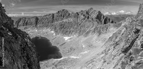 The High Tatras - Slovakia - The look from Bystre sedlo mountain gap to Krivan peak in the background and the lake - Vysne Wahlenbergovo pleso. photo