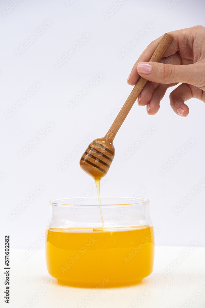 honey in a glass jar honey in a glass jar