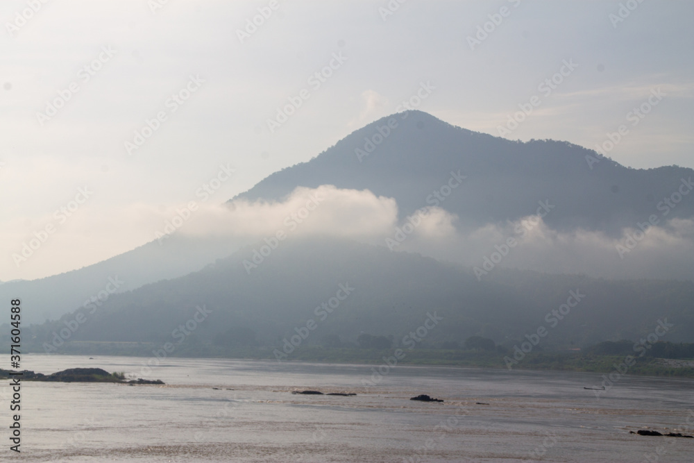 Mountain lake shore landscape. Mountain lake view. Lake in mountains. Mountain forest lake