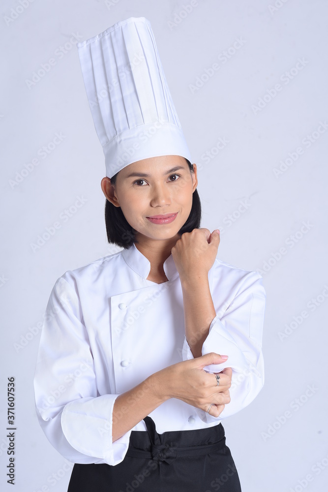 Portrait of female chef isolated on white Portrait of female chef isolated on white