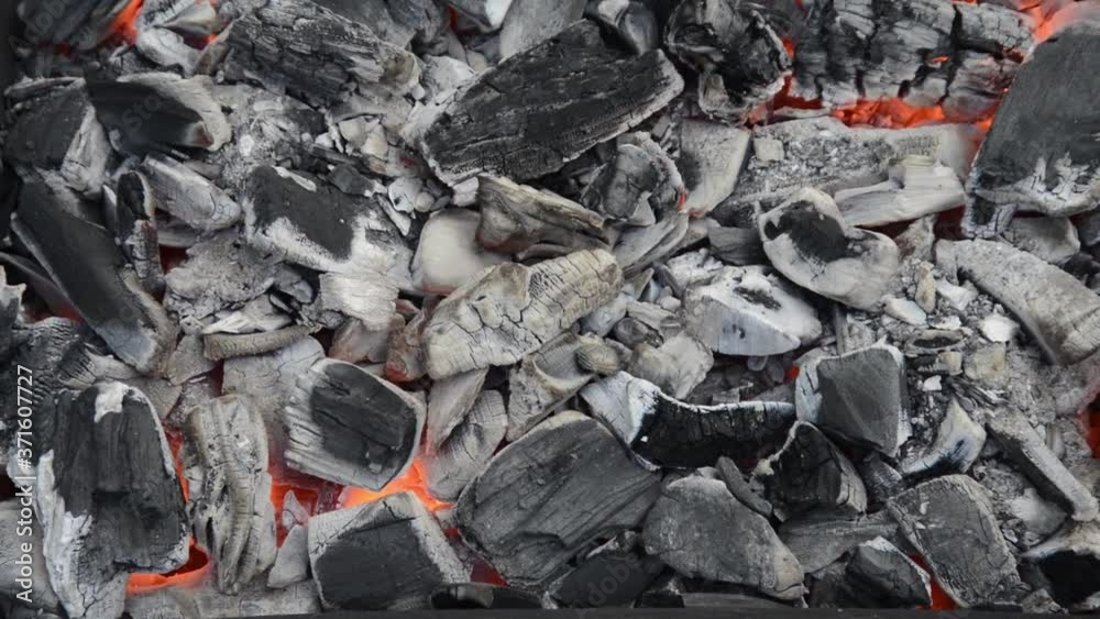 Coals burning in the grill for barbecue. Coals burning in the grill for barbecue.