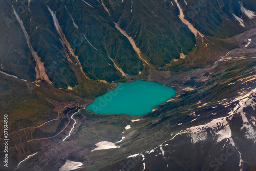 aerial view of beautiful lake in mountains,  saif ul  maluk lake  landscapes , lakes peaks and valleys Karakorum range and gilgit Baltistan , Pakistan  photo
