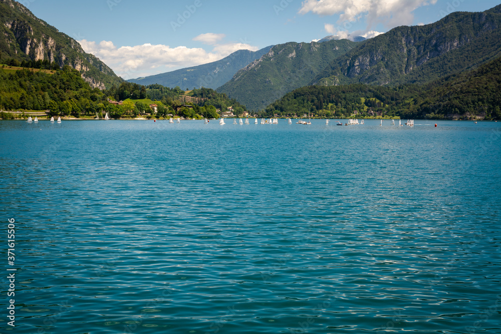 Ledro, Italy. Sailing school on small boats. School on Lake Ledro. Alpine lake. Summer time. Trentino Alto Adige,northern italy, Europe