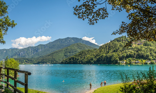 Ledro, Italy. The Ledro lake and Its beaches. A natural alpine lake. Amazing turquoise, green and blue colors. Ledro Valley, Trentino Alto Adige, Italy
