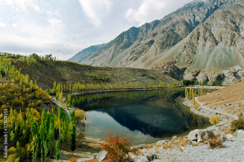 landscapes of phandar lake in ghazar . lakes peaks and valleys karakorum range and gilgit baltistan , Pakistan  photo