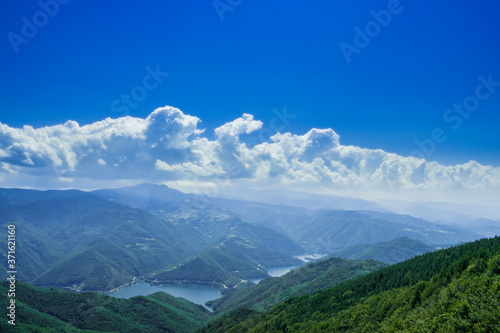 View of Vacha water reservoir from Bekovi Rocks, Rhodopes Mountains, Ravnogor, Bulgaria photo