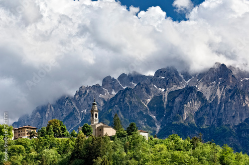 The village of Parrocchia and in the background Mount Carega of the Piccole Dolomiti. Vallarsa  Trento province  Trentino Alto-Adige  Italy  Europe.