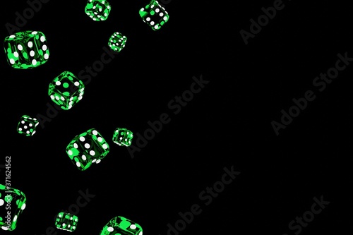 Transparent green flying dice on a dark background 3D illustration