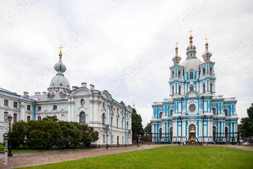Smolny Cathedral close-up on cloudy afternoon day. Unique urban landscape center Saint Petersburg. Central historical sights city. Top tourist places in Russia. Capital Russian Empire