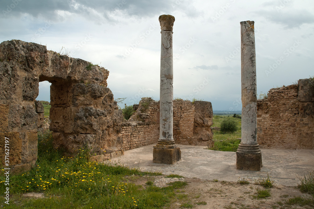 Thuburbo Majus Tunisia, roman ruins against a stormy sky