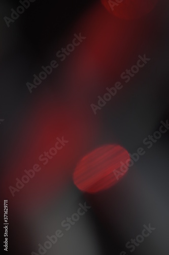 Red and white bokeh background with light leaks
