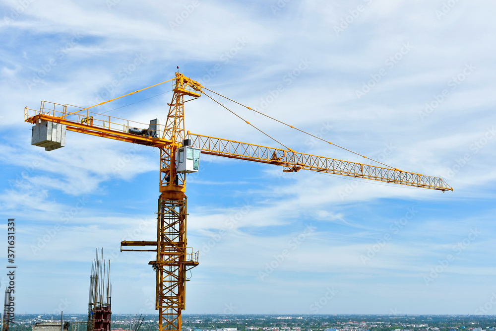 The Crane tower in construction  site of a high-rise condominium.