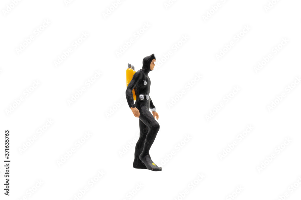Miniature people : Scuba diver isolated on white background with clipping path Miniature people : Scuba diver isolated on white background with clipping path
