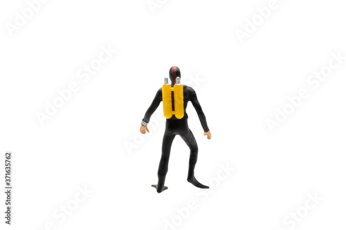 Miniature people   Scuba diver isolated on white background with clipping path
