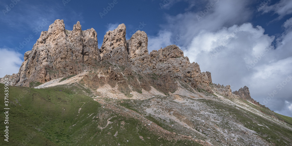 Denti di Terrarossa (Terrarossa Teeth) peaks, part of Sciliar/Schlern mountain chain, seen on the trail from Alpe di Tires refuge down to Alpe di Siuse/Seiser Alm plateau, Dolomites, Italy
