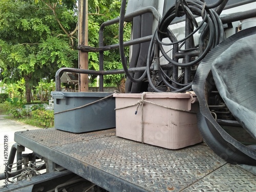 Plastic Luggage Boxes Mounted On The Back Of The Truck For Traveling.