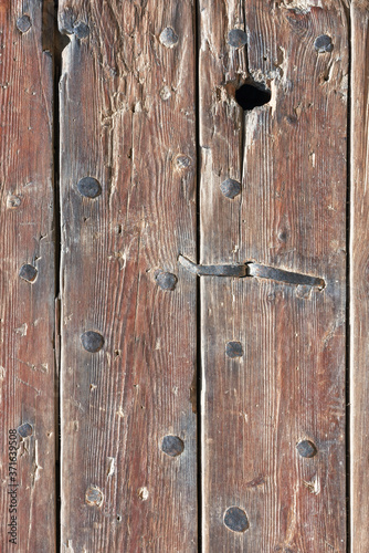 Abstract texture with old unpainted wooden planks