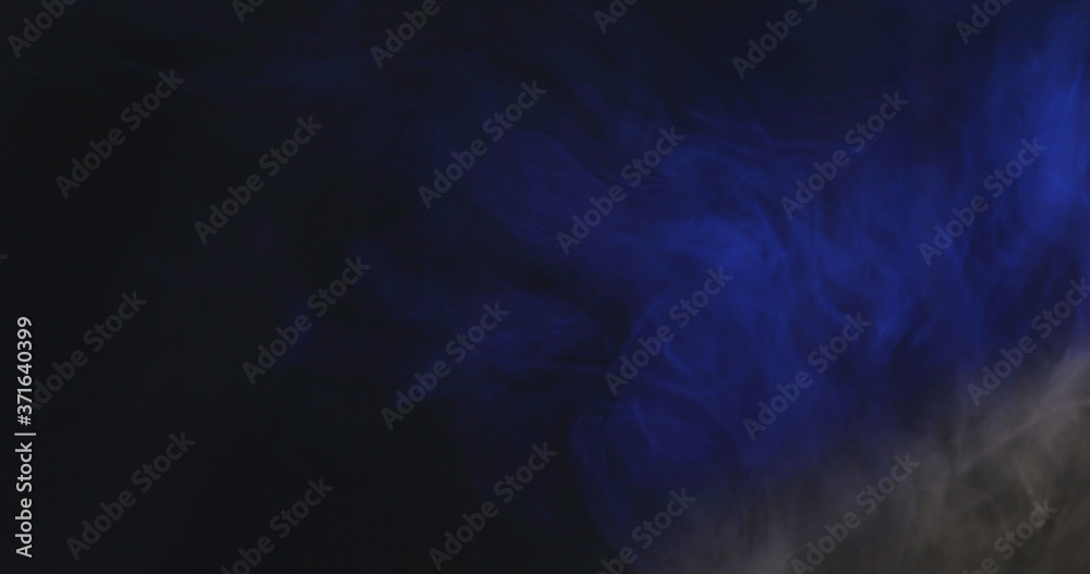 Multicolored smoke flies through the air Multicolored smoke flies through the air