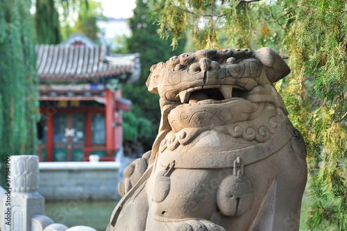 China, Beijing stone lion statues.