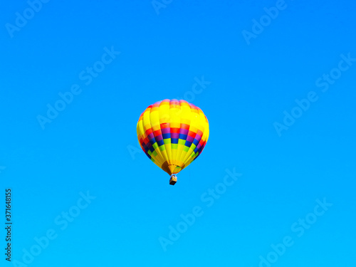 Colorful Balloon flyng in the blue sky